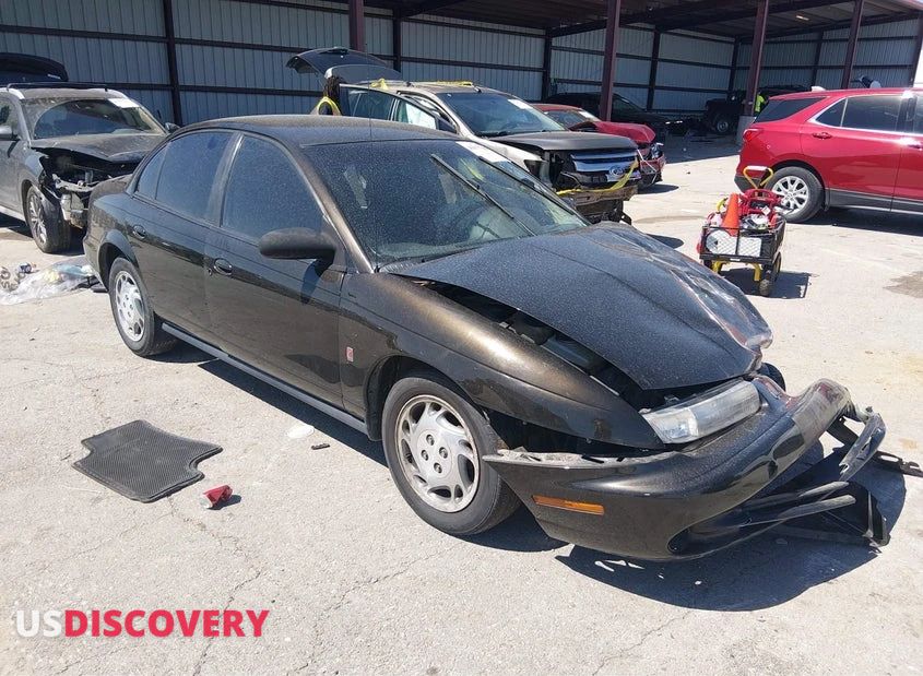 1997 Saturn SL — Left Front — aukcja IAAI mo - odessa - 1