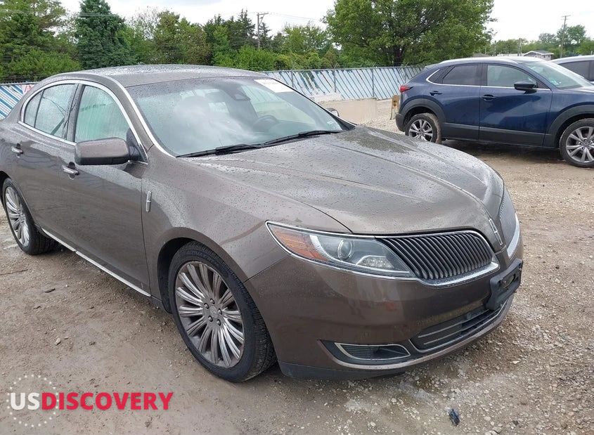 2015 Lincoln MKS — Left Rear — aukcja IAAI 16425 crawford ave - 1
